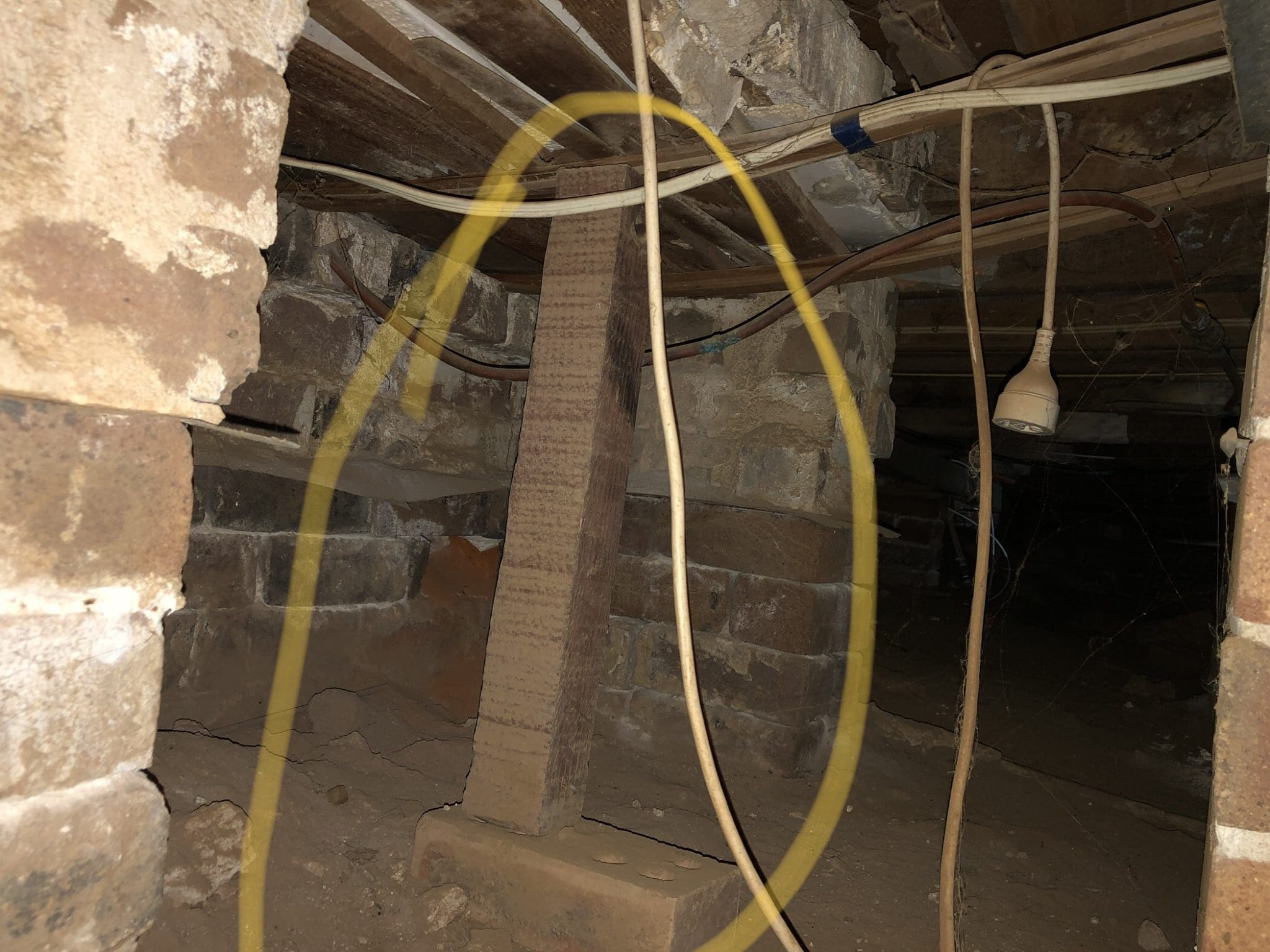 Timber "pier" in the subfloor of a house in Camden